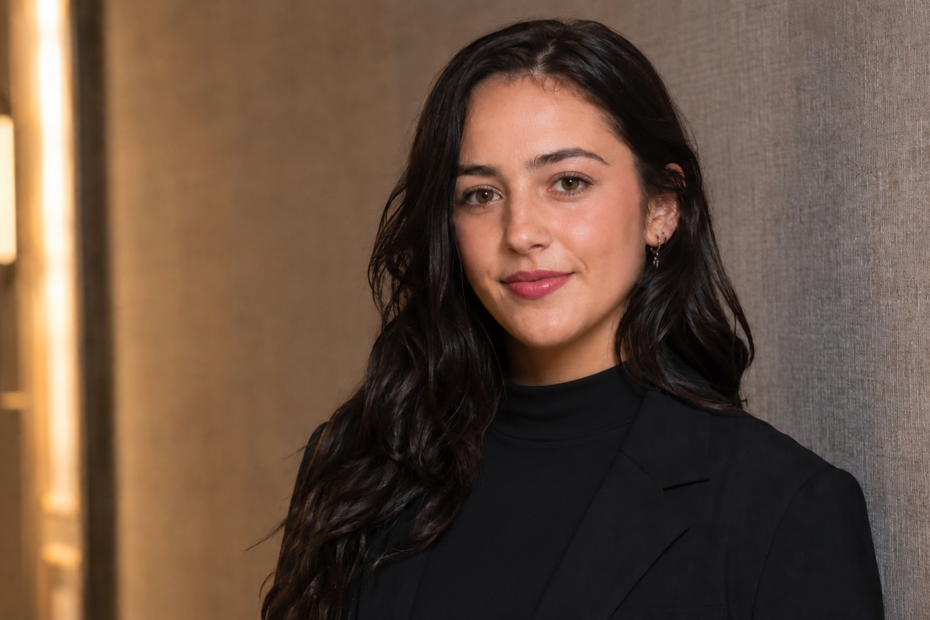 Bella Noche Ruffalo wearing a modest black high-neck outfit in an editorial portrait
