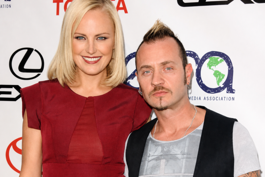 Malin Akerman posing with Roberto Zincone at a red carpet event